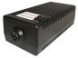 Preview: The image displays a black, rectangular device with a ribbed structure on the top. On one side, there is a circular connector and a small switch. It has a slight elevation in the middle.