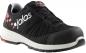 Preview: The shoe is black with white and red accents. It features a sporty design, a non-slip sole, and a reinforced toe cap. Instead of laces, there is a simple twist-lock system.