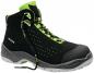 Preview: The shoe is a black oxford with green accents. It has a padded tongue and eyelets for braided laces. The sole is sturdy and provides good grip.
