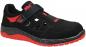 Preview: The shoe is a sporty half-shoe in black with red accents. It has a wide Velcro strap and open areas on the side for ventilation. The sole is non-slip and lightweight.