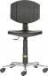 Preview: The image shows a black office chair with an ergonomically shaped back and a padded seat. It has casters and an adjustable height. The base is silver-colored.