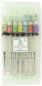 Preview: The image shows a transparent case with seven pens. Each pen has a differently colored cap visible at the top. The pens are labeled and the label is located in the middle of the case.