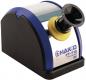 Preview: The image displays an electric tip cleaner. It features a rounded black base, a transparent lid, and a circular opening with a yellow border. The brand "HAKKO FT-710" is visible.