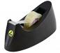 Preview: The image shows a black tape dispenser holding a roll of transparent adhesive tape. The dispenser has a slightly rounded shape and a beveled edge for easy tearing.