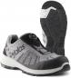 Preview: The image displays a gray, sporty shoe with a black rubber sole. It features a breathable upper and a laceless BOA closure system for easy adjustment.