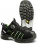 Preview: The image shows a black safety shoe with green accents. It features a sturdy sole with deep tread and a lacing system that can be adjusted with a twist lock.