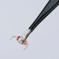 Preview: The image shows a pair of pliers with a black handle. At the end, there is a silver metal clamp with two small pink rubber balls that form a flexible structure.