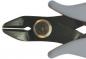 Preview: The image shows a pair of pliers with gray, ergonomic handles. The head is black and features an oval opening for gripping and cutting materials. A circular metal button is in the center.