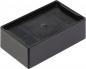 Preview: The image shows a rectangular, flat box made of black plastic. It has high side walls and a uniform, smooth lid with no special decorations.
