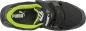 Preview: The image shows a black sports shoe with a green insole. The shoe features a wide Velcro strap and a sporty design. The Puma logo is clearly visible.