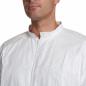 Preview: The image shows a man wearing a white top. The top has a high collar and a full-length front zipper. The texture appears light and wrinkly.