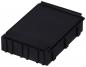 Preview: The image shows a rectangular, black plastic box with a flat lid. The surface is smooth, and the sides have vertical notches.