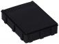 Preview: The image shows a black, rectangular box with a flat lid. The box has vertical grooves on the sides and appears stable and sturdy. It is larger than a deck of cards.