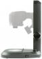 Preview: The image shows a medical device for eye examination, consisting of a sturdy base, a vertical arm, and a head that can be adjusted for examination.