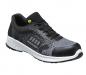 Preview: Der Schuh ist sneakerähnlich, mit einem schwarzen oberen Teil aus flexibel gestricktem Material und einer stabilen, weißen Sohle. Er hat eine sportliche Form und Schnürsenkel.
