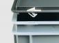 Preview: The image shows stackable, rectangular containers in gray and light gray with a lid. A small white clip on a lid is visible, which serves as a fastener.