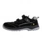 Preview: The image shows a black children's shoe made of suede with two Velcro straps. The sole is gray and provides a sturdy, non-slip surface. The shoe has a sporty shape.