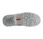 Preview: The image shows the sole of a sports shoe. It is light gray with a non-slip tread that consists of various patterns. In the center, the word "BRAK" is visible in red lettering.