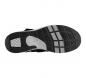Preview: The image shows the underside of a shoe. The sole is black with light gray and white grooves and patterns that provide better grip. It appears sturdy and functional.