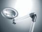 Preview: The image shows a modern light arm with a large, round lamp. The arm is swivelable and made of silver metal, with a clear, focused light inside the lamp.