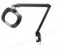 Preview: The image shows a flexible magnifying glass with an adjustable mount. It has a large, round frame and is attached with a clamp. Ideal for detailed work.