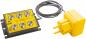 Preview: The image shows a yellow junction box with six round sockets and a cable. Next to it is a yellow power plug with two flat prongs.