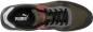Preview: The image shows a sports shoe in various shades of green. The shoes have black laces and are decorated with gray and red accents. The Puma logo is visible.