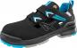 Preview: The shoe is black with blue and gray accents. It has two Velcro straps and a sturdy sole. The design is sporty and functional, ideal for active use.
