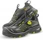 Preview: The image shows a pair of black sports shoes with yellow accents. They have a modern shape, are straightforward, and feature a grippy sole with a sturdy, breathable material.