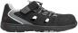 Preview: The shoe is black with gray accents. It has a breathable upper with multiple ventilation holes and a stable, non-slip sole. Lacing and Velcro closure for optimal support.