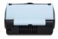 Preview: The image displays a compact device in black and blue. The top is light blue with two grooves. On the bottom, ventilation slots and a connector socket are visible.