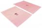 Preview: Two transparent, pink bags are lying next to each other. They have a sealable top edge. Each bag features a black print with logos and information.