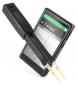 Preview: The image shows an electronic measuring device with a display where values can be read. It has two attachable clamps for conducting electrical measurements.