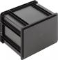 Preview: The image shows a square, black plastic box with a flat lid. It has a robust structure with grooves on the sides for stability and a minimalist, functional style.