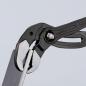 Preview: The image shows a black pair of pliers from Knipex, which is open. The pliers have a textured gripping surface and an adjustable position for various objects.