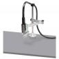 Preview: The image shows an assembly fixture with a welding device attached to a metal arm. The arm is mounted on a sturdy base, and a flexible cable connects the parts.