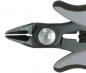 Preview: The image shows a pair of pliers with a pointed, narrow opening. The body is black with gray, ergonomic handles. In the center, a metal axis is visible.