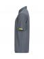 Preview: The image shows a gray polo shirt made of a fine fabric. It has short sleeves and a classic collar. There is a yellow label on the left sleeve. The surface features a fine striped pattern.