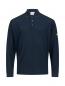 Preview: The image displays a long-sleeved polo shirt in dark blue. It features a classic collar with three buttons and a colored appliqué on the sleeve. The material appears casual and sporty.