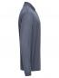 Preview: The image displays a long-sleeved, dark blue top with a collar. The surface features a fine texture, and the sleeves end in cuff-like finishes.