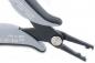 Preview: The image shows a pair of pliers with gray handles and a black, pointed working surface. The handle is ergonomically shaped, and the pliers have two claws for gripping or pulling.
