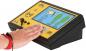Preview: The image shows an interactive device with a touchscreen. A hand is resting on the device. On the screen, there are icons for clothing and shoes that display information.
