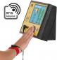 Preview: The image shows a control device with a screen displaying information. Below it is a hand pointing to the screen. A red bracelet is on the wrist.