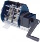 Preview: The image depicts a manual machine with a handle. It features two rollers and an area where paper strips are processed. The mechanism appears sturdy and functional.