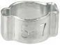 Preview: The image shows a small, silver metal bracket. It has a round opening in the center and is slightly wavy at the top and bottom. On the side, the numbers "5-7" are engraved.