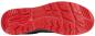 Preview: The image shows the sole of a shoe. It is predominantly black with a striking, textured red area. The sole features various patterns for improved grip and flexibility.