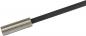 Preview: The image shows a long, thin screwdriver with a metallic handle and a black, flat blade. The blade is straight and narrow.