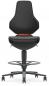 Preview: The image shows a black office chair with a high backrest. The seat is padded and has a round footrest. The chair is mounted on five casters.
