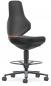 Preview: The office chair has a high backrest and a padded seat. It stands on a swivel base with five casters. A footrest is also included. The colors are primarily black with orange accents.