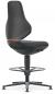 Preview: The image shows a stylish, black swivel chair with a medium-high back. The seat is padded, and the chair has footrests as well as a simple, modern base.